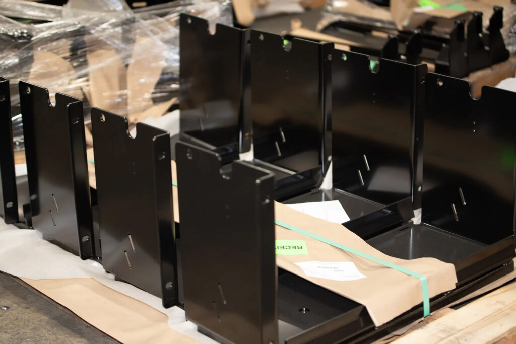 Forming presses, laser cutters, and CNC systems are arranged to respond rapidly.